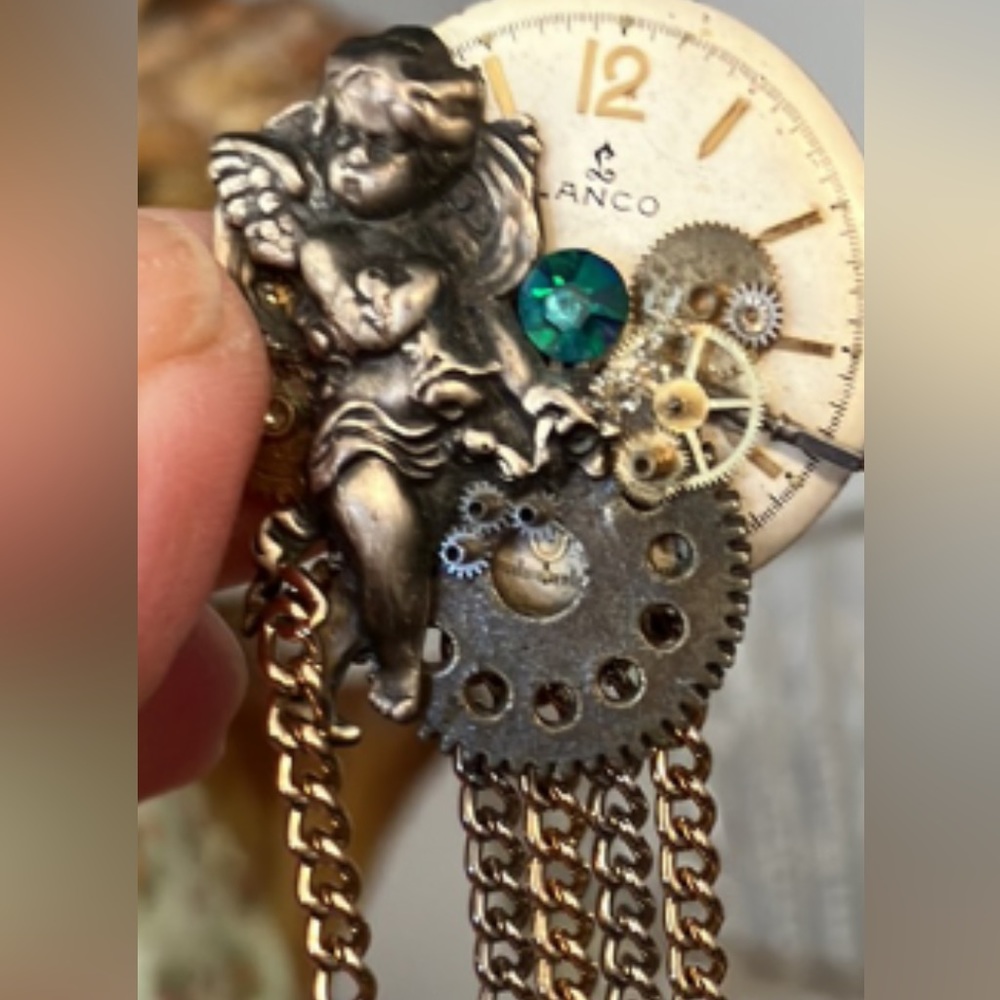 Vintage brooch - angel and made with parts from watch